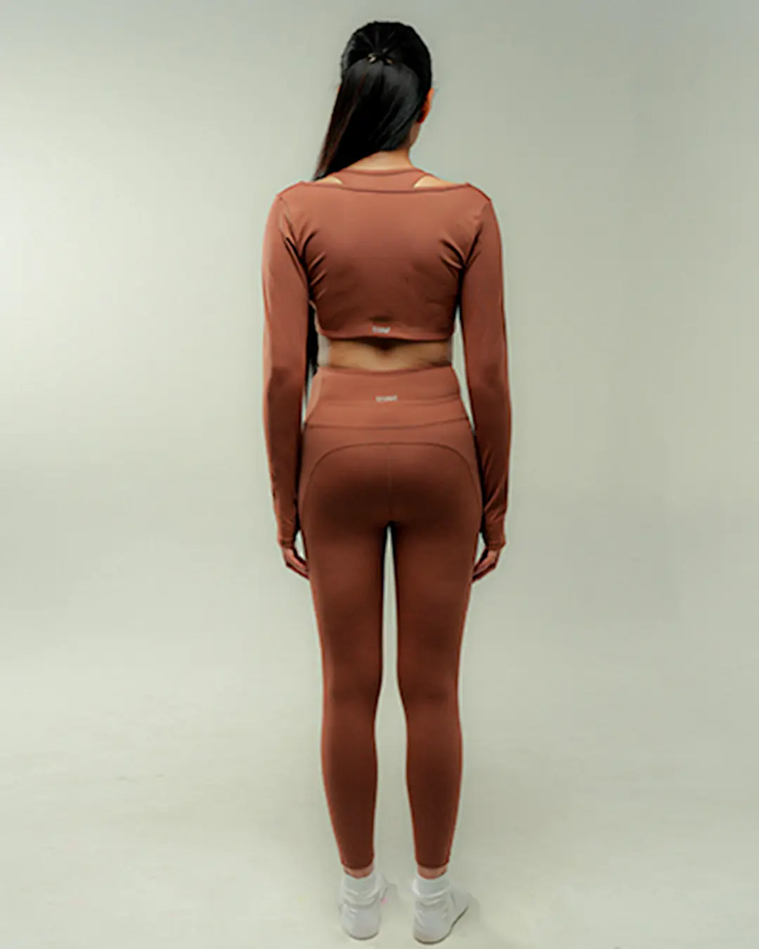 Truffle Crisscross Hourglass Leggings back view with a sleek fitted finish