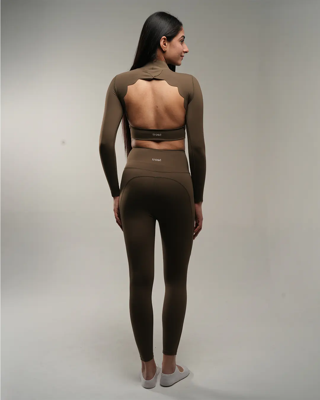 Cypress-colored Crisscross Hourglass Leggings back view with a sleek fitted finish