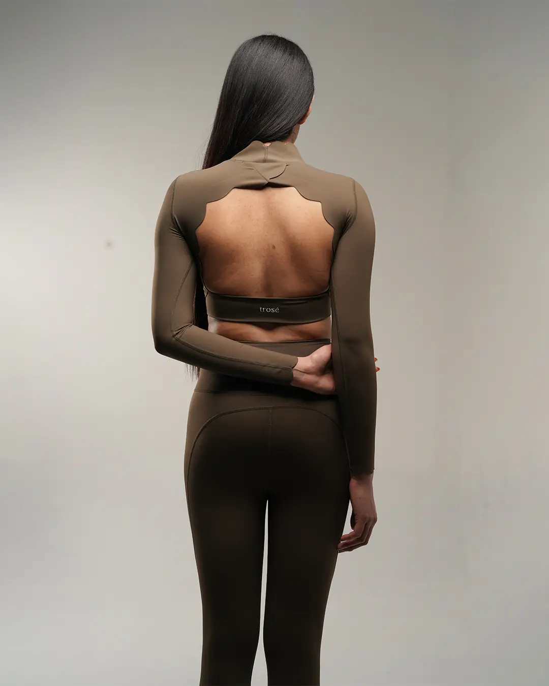 Cypress-colored Crisscross Hourglass Leggings back view with a sleek fitted finish